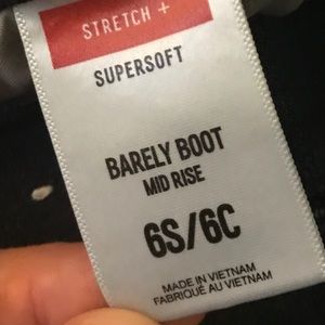 Express jeans, barely boot, dark blue denim jeans.